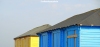 Yellow and blue beach huts at Fleetwood, Lancashire