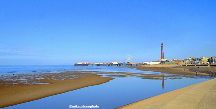 A view of Blackpool Beach and Tower on a bright autumn day.